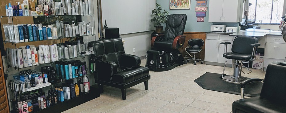 Salon overview, lots of hair products and a location for hair cuts and styles